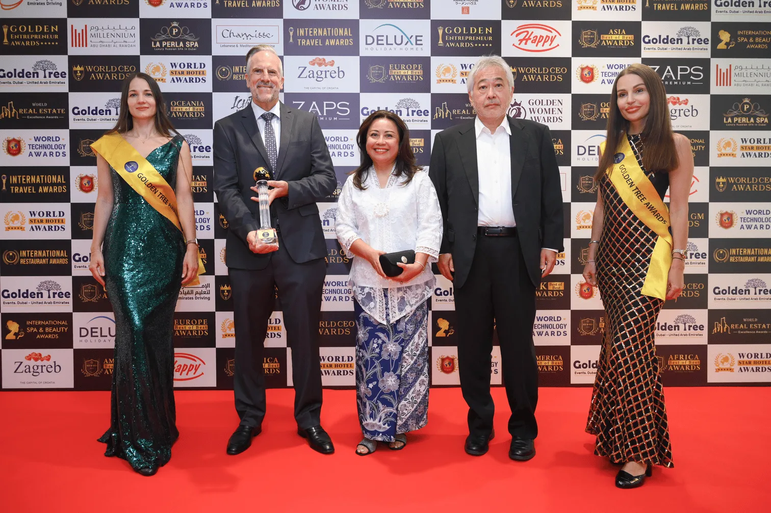 Winners holding a globe trophy on the red carpet at the gala that follows each hospitality awards nomination 2027 cycle