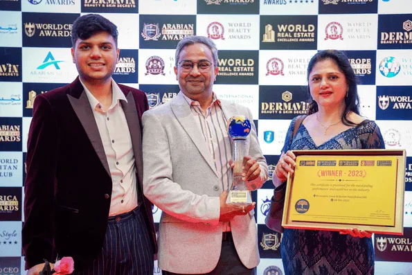 Winner receiving a trophy at a Hospitality Awards gala