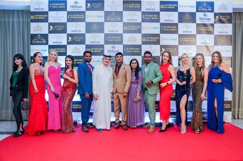 Winners posing together on the red carpet